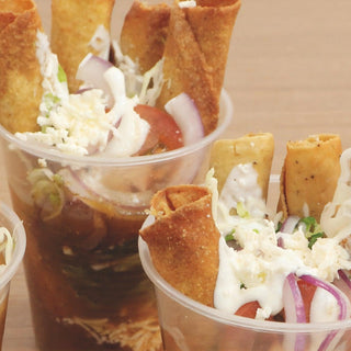 Tacos dorados en vaso